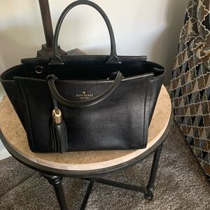 Kate Spade Black Satchel with Structured Design.